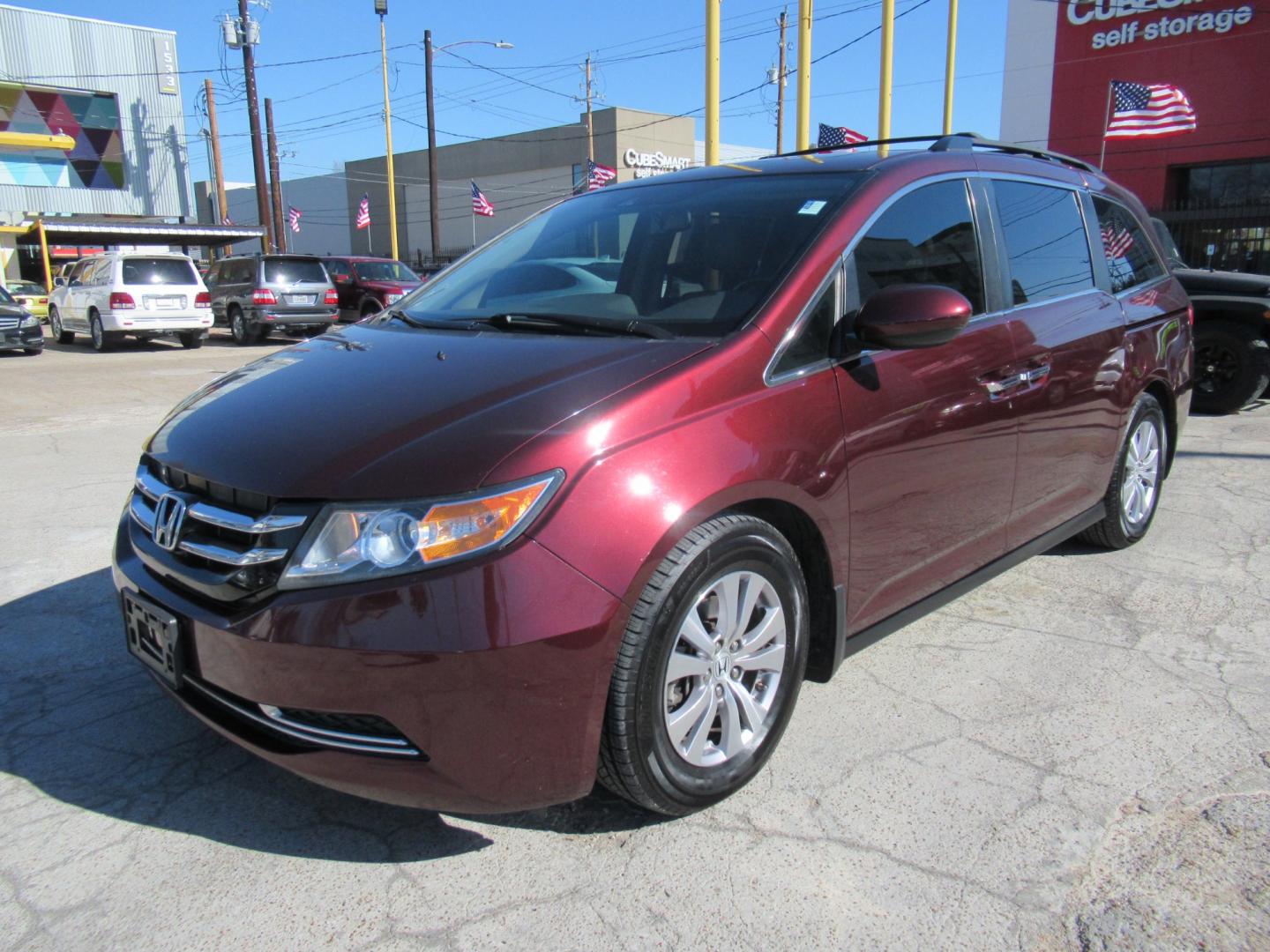 2016 Red /Tan Honda Odyssey EX-L (5FNRL5H62GB) with an 3.5L V6 SOHC 24V engine, Automatic transmission, located at 1511 North Shepherd Dr., Houston, TX, 77008, (281) 657-1221, 29.798361, -95.412560 - 2016 HONDA ODYSSEY EX-L VIN: 5FNRL5H62GB103369 5 F N R L 5 H 6 2 G B 1 0 3 3 6 9 VAN 3.5L V6 F SOHC 24V GASOLINE FRONT WHEEL DRIVE - Photo#29